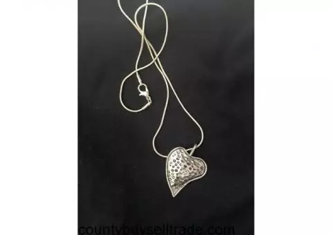 pounded metal heart necklace