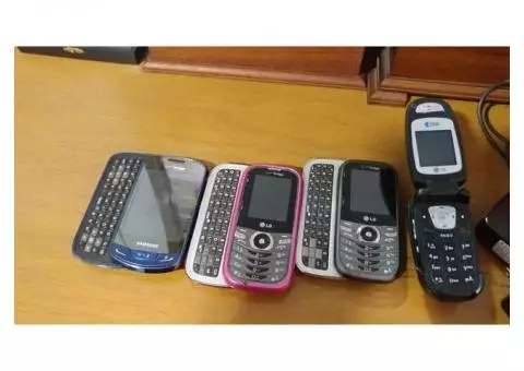 Several older style cell phones
