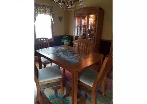 Dining room table,  4 chairs,  China hutch