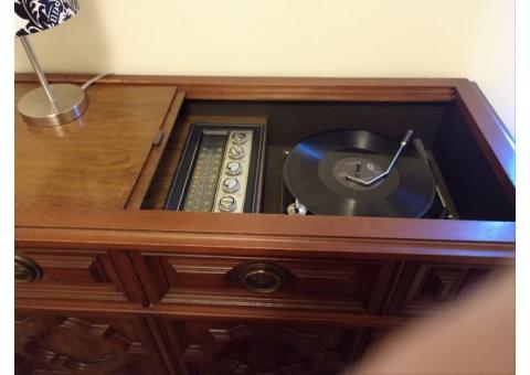 Magnavox Antique Stereo/Radio in cabinet.