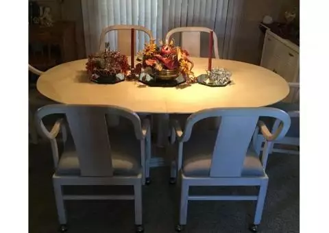 Thomasville table, 6 padded coastered chairs, matching bar and 2 cabinets
