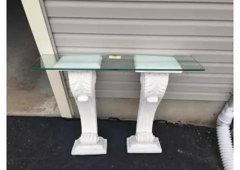 Two pedestals with glass top