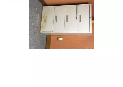 One four-drawer file cabinet