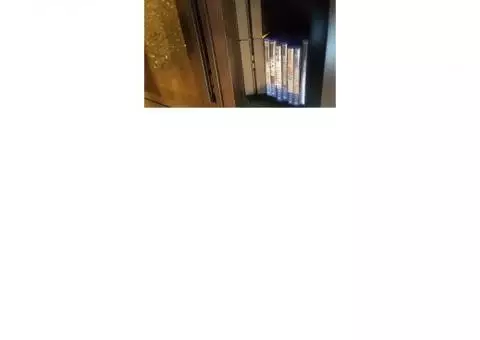 PlayStation 4 w/2 controllers and Games