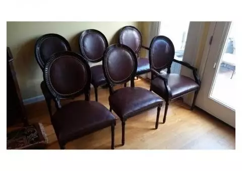 a set of 6 chairs, two with arm rests, four without