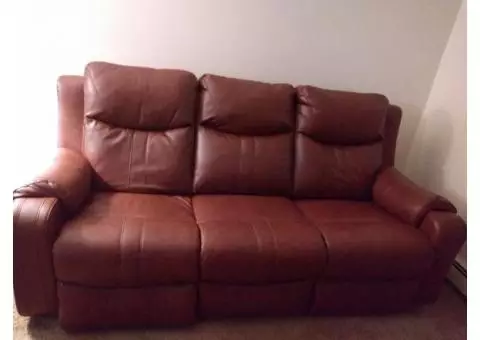 Leather powered reclining couch